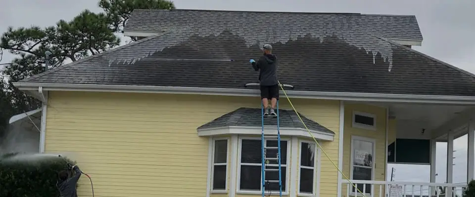 Soft wash roof cleaning with eco-friendly cleaning products