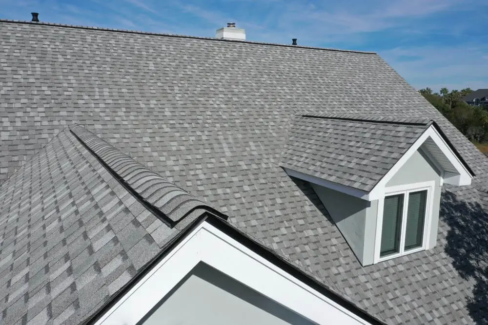 Shingle roof cleaned by exterior cleaning experts using low-pressure soft wash